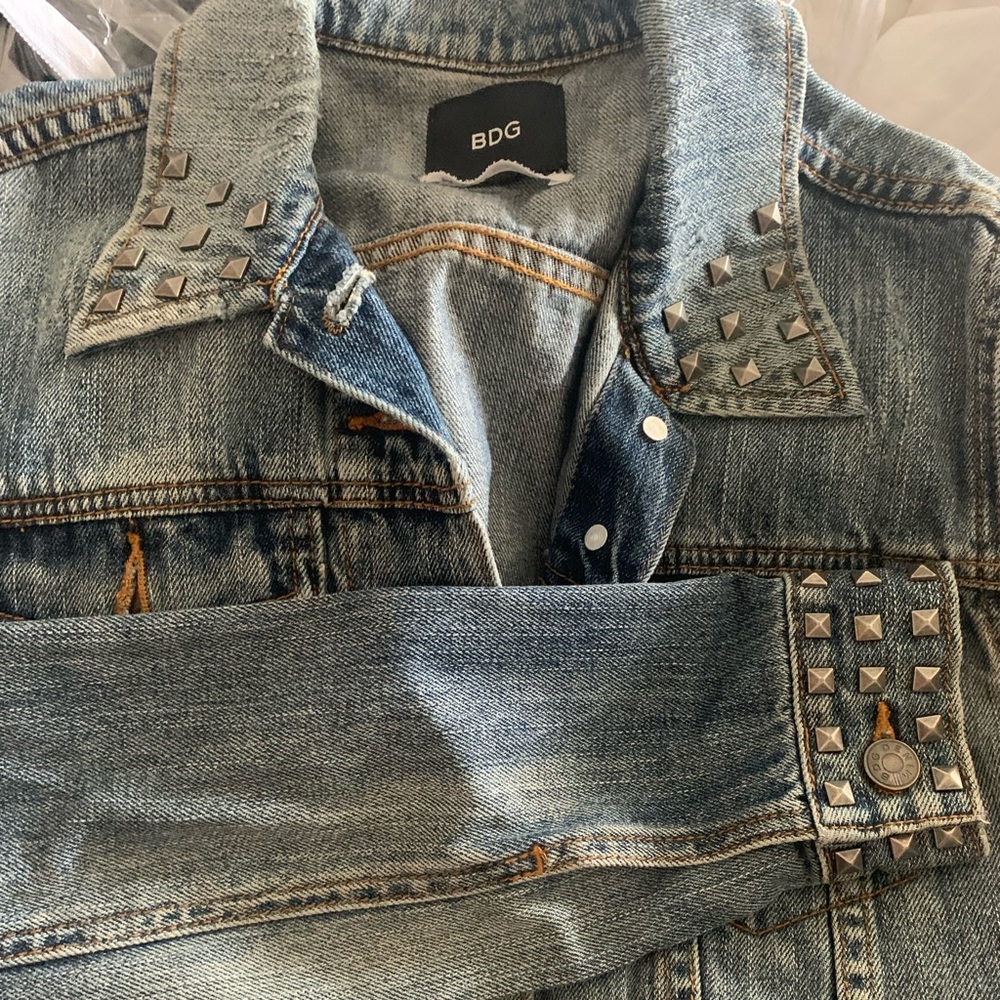 Studded denim jacket — can be dressed up or down. Adorable just too small.